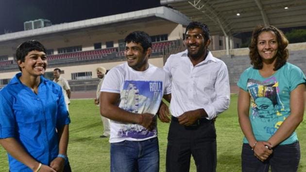 Keeping the future in mind, the Wrestling Federation of India (WFI) has included some young and upcoming wrestlers in the Target Olympic Podium Scheme (TOPS) while removing Sushil Kumar (2nd from left), Yogeshwar Dutt (2nd from right), Babita Phogat (left) and Geeta Phogat. (Getty Images) Keeping the future in mind, the Wrestling Federation of India (WFI) has included some young and upcoming wrestlers in the Target Olympic Podium Scheme (TOPS) while removing Sushil Kumar (2nd from left), Yogeshwar Dutt (2nd from right), Babita Phogat (left) and Geeta Phogat. (Getty Images)