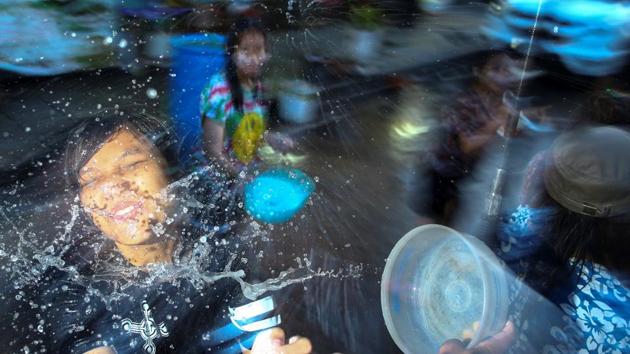 Locals take part in a water fight at Songkran Festival celebrations in Bangkok. (REUTERS)