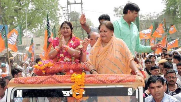 CM Vasundhara Raje with BJP candidate Shobha Rani Kushwaha in Dholpur. (HT File Photo) CM Vasundhara Raje with BJP candidate Shobha Rani Kushwaha in Dholpur. (HT File Photo)