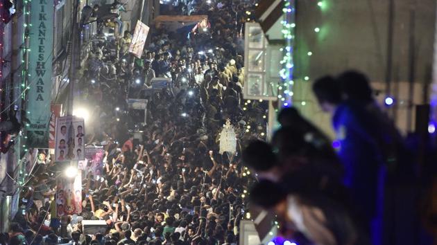 Devotees gathered along the lane as Karaga moves on the occasion of Karaga at Dharmaraya Swamy Temple in Bengaluru, India, on Wednesday, April 12, 2017. This is over 800 yrs old festival of worshiping adishakti Draupadi. Every year, the Thigalas celebrate a festival called Karaga. The story of the Karaga is also rooted in the Mahabharata.Draupadi is the community deity of the Vahnikula Kshytriyas. The Karaga is an annual celebration of her as the ideal woman and of woman-power (Mother Goddess). (Arijit Sen/HT Photo) Devotees gathered along the lane as Karaga moves on the occasion of Karaga at Dharmaraya Swamy Temple in Bengaluru, India, on Wednesday, April 12, 2017. This is over 800 yrs old festival of worshiping adishakti Draupadi. Every year, the Thigalas celebrate a festival called Karaga. The story of the Karaga is also rooted in the Mahabharata.Draupadi is the community deity of the Vahnikula Kshytriyas. The Karaga is an annual celebration of her as the ideal woman and of woman-power (Mother Goddess). (Arijit Sen/HT Photo)