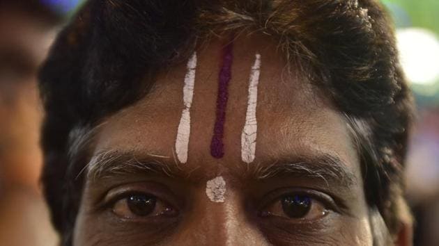 A man sports tilak on the occasion of Karaga. (Arijit Sen/HT Photo) A man sports tilak on the occasion of Karaga. (Arijit Sen/HT Photo)