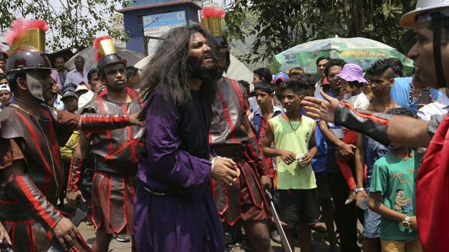 For Christians, it is the most sorrowful, sombre and sacred day of the year. (Rajanish Kakade / AP)