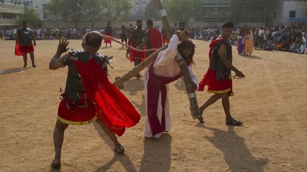 Some areas hold three-hour long special services in noon – the time when Jesus is said to have been crucified. The lights are dimmed and eventually extinguished. (Mahesh Kumar A. / AP)