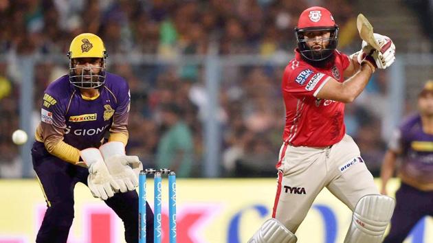Kings XI Punjab batsman Hasim Amla plays a shot during their IPL match against Kolkata Knight Riders. (PTI)