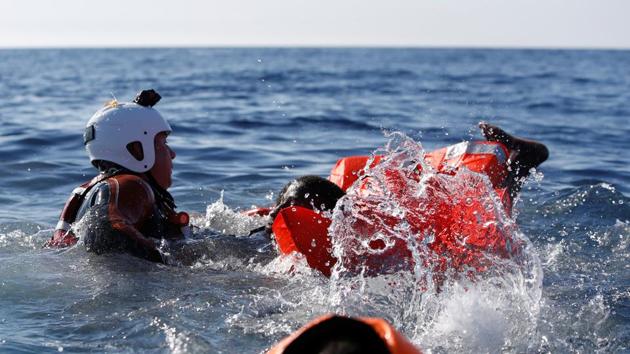 In Pics: Hundreds Of Migrants Surge From Sub-Saharan Africa Into Italy ...