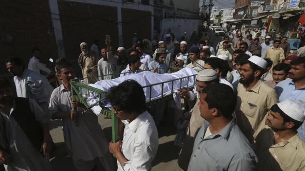 Villagers carry a body of the student for burial in Swabi, Pakistan on Friday.(AP) Villagers carry a body of the student for burial in Swabi, Pakistan on Friday.(AP)