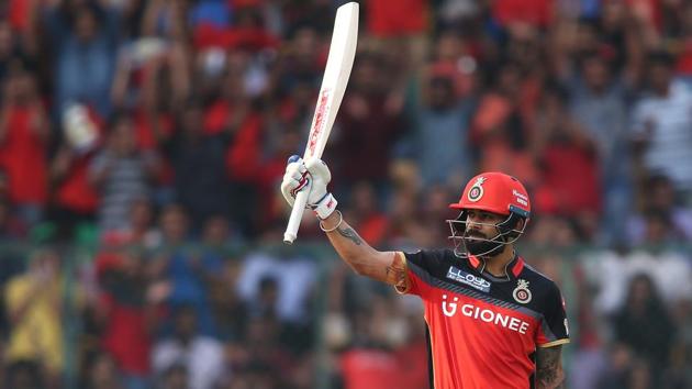 Virat Kohli raises his bat after reaching his fifty, off just 39 balls. He scored 62 off 47 balls. (BCCI)