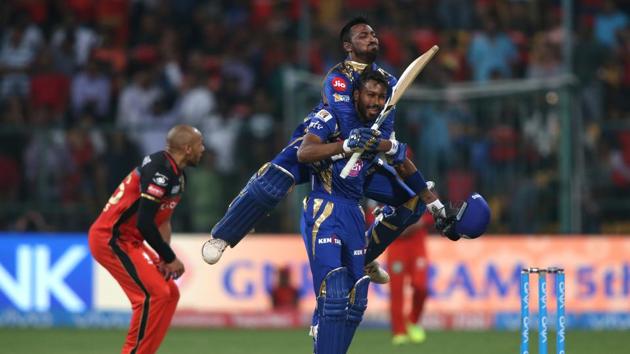 Krunal Pandya jumps on Hardik Pandya after Mumbai Indians beat Royal Challengers Bangalore by four wickets in Bangalore on Friday. (BCCI)