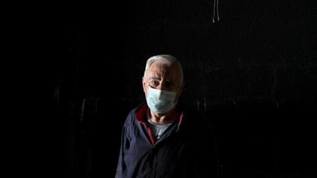 Sabri, a restaurant owner, poses for a picture as he cleans his burnt-out restaurant. Encouraged by security checkpoints and patrols by a volunteer force, up to 10 Christian families have returned to what used to be the minority’s biggest community in Iraq until Islamic State seized it in 2014. (Marko Djurica/Reuters)