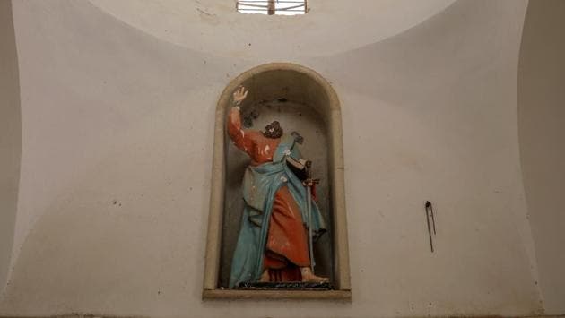 A damaged religious statue is seen inside a church. Most Sunnis, who are the dominant community in Mosul, have shrugged off the Shi’ite slogans as the work of a handful of religious zealots but Christians take them as a signal that their future remains uncertain. (Marko Djurica/Reuters)