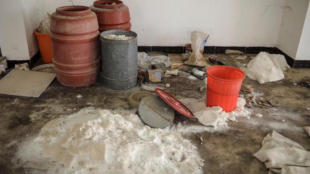 Chemicals used by Islamic State militants to produce bombs are seen inside a warehouse at a church. (Marko Djurica/Reuters)