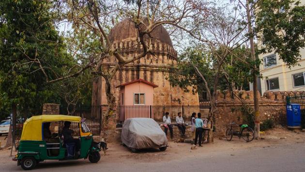 This unnamed tomb is located in the residential area called Sadhna Enclave in Panchsheel Park. Identified as a tomb from the Lodi era due to its architectural similarities to buildings from that time period, this piece of history has been nearly been claimed by the settlement around it. (Vageesh Lall/HT Photo)