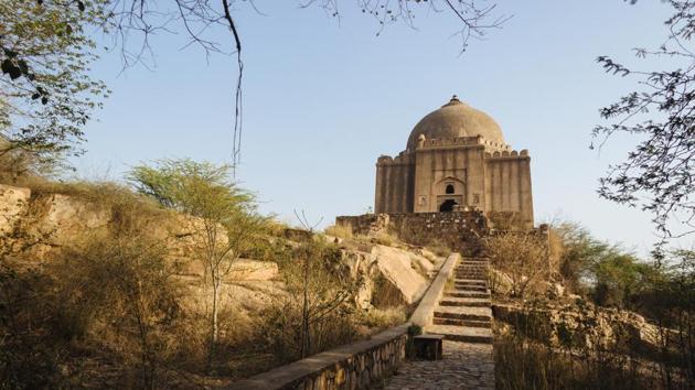 Azim Khan’s Tomb was built in the the 17th century by the later Mughals and is located near the intersection of Mehraulli-Badarpur road and Anurvat road. Being placed a top a rock hill gives this monument a very prominent appearance making it almost symbolic of this area in South Delhi yet its history is not well known. (Vageesh Lall/HT Photo)
