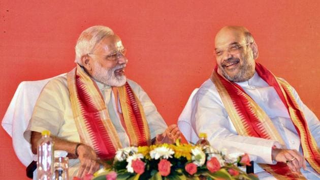 Prime Minister Narendra Modi with party president Amit Shah at BJP's national executive meet in Bhubaneswar on Saturday.(PTI)