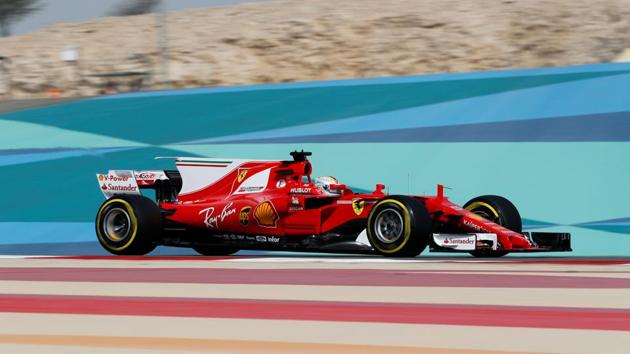 Ferrari Formula One driver Sebastian Vettel of Germany drives during the first practice session of the Bahrain F1 Grand Prix. (REUTERS) Ferrari Formula One driver Sebastian Vettel of Germany drives during the first practice session of the Bahrain F1 Grand Prix. (REUTERS)