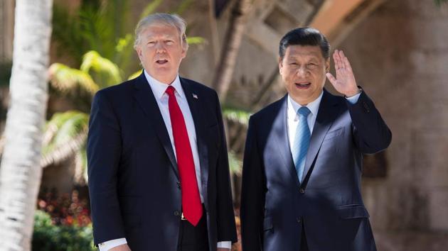US President Donald Trump (L) with Chinese President Xi Jinping.(AFP Photo)