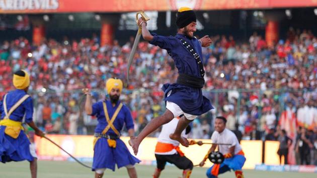 An artist performs at the opening ceremony. (BCCI)