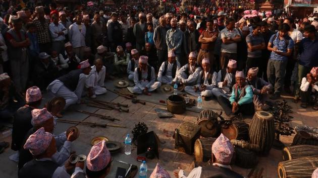 A group of musician gather among the crowd at the Nyatapola temple to fill its massive courtyard with the sounds of devotion. (Photo By Nipun Prabhakar)