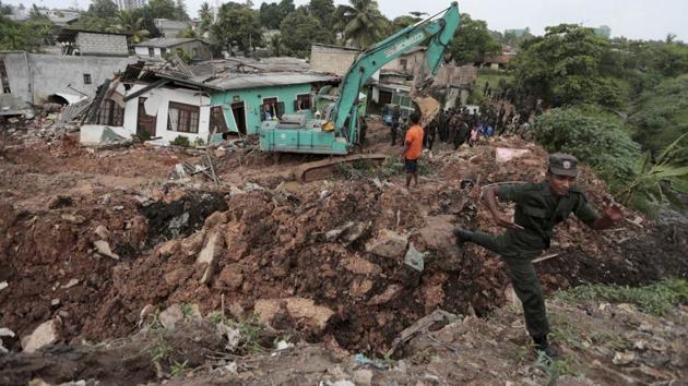 The 300-foot-high (90-metre) dump in the capital Colombo collapsed after flames engulfed it late on Friday, the nation’s new year’s day (AP)