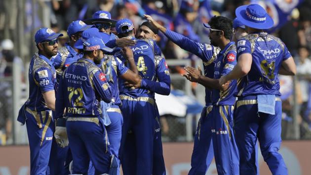 Mumbai Indians players celebrate the wicket of Gujarat Lions batsman Suresh Raina. (AP)
