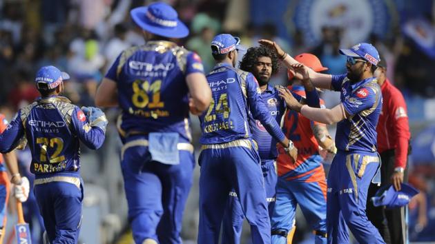 Mumbai Indians players celebrates the wicket of Gujarat Lions batsman Brendon McCullum. (AP)