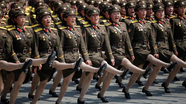North Korean soldiers march and shout slogans during a military parade. (Damir Sagolj / REUTERS)