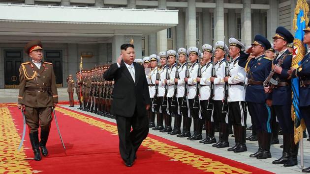 This April 15, 2017 picture released from North Korea's official Korean Central News Agency (KCNA) on April 16, 2017 shows North Korean leader Kim Jong-Un (C) arriving for a military parade in Pyongyang marking the 105th anniversary of the birth of late North Korean leader Kim Il-Sung. (AFP)