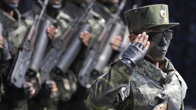 Commandoes march across Kim Il Sung Square during a military parade. (Wong Maye-E / AP)