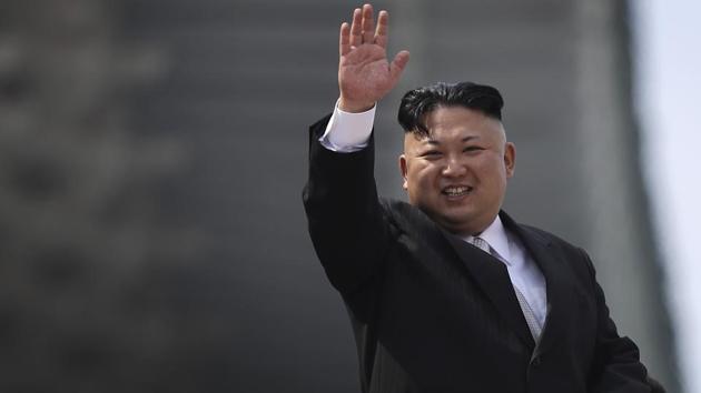 North Korean leader Kim Jong Un waves during a military parade in Pyongyang, North Korea to celebrate the 105th birth anniversary of Kim Il Sung, the country's late founder and grandfather of current ruler Kim Jong Un. (Wong Maye-E / AP)