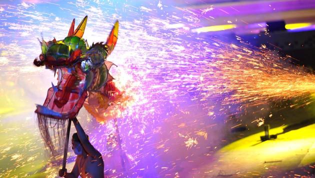 People perform the fire dragon dance in Taijiang, Guizhou province, April 11, 2017. Picture taken April 11, 2017. (REUTERS)