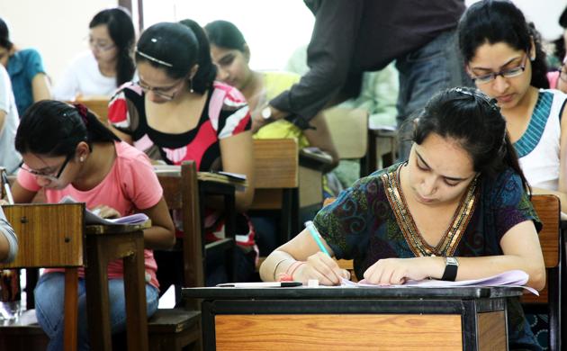 Students taking a postgraduate exam at Delhi University’s North Campus. Candidates taking a postgraduate exam at Delhi University’s North Campus. More than two crore students in the country appear in Class 10 and around 1.5 crore in Class 12 exams conducted by more than 40 education boards. (Hindustan Times) Students taking a postgraduate exam at Delhi University’s North Campus. Candidates taking a postgraduate exam at Delhi University’s North Campus. More than two crore students in the country appear in Class 10 and around 1.5 crore in Class 12 exams conducted by more than 40 education boards. (Hindustan Times)