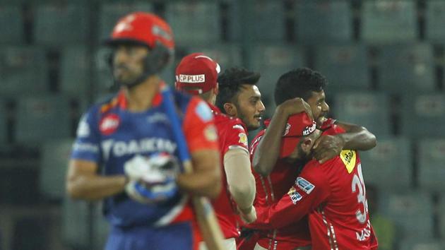 Kings XI Punjab however struck back with quick wickets, reducing Delhi Daredevils to 120/5 at one time. Here, Varun Aaron celebrates the wicket of Karun Nair. (BCCI)
