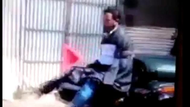 The video showing a man tied to a jeep as a human shield against protesters has triggered outrage in Kashmir. (Video grab) The video showing a man tied to a jeep as a human shield against protesters has triggered outrage in Kashmir. (Video grab)
