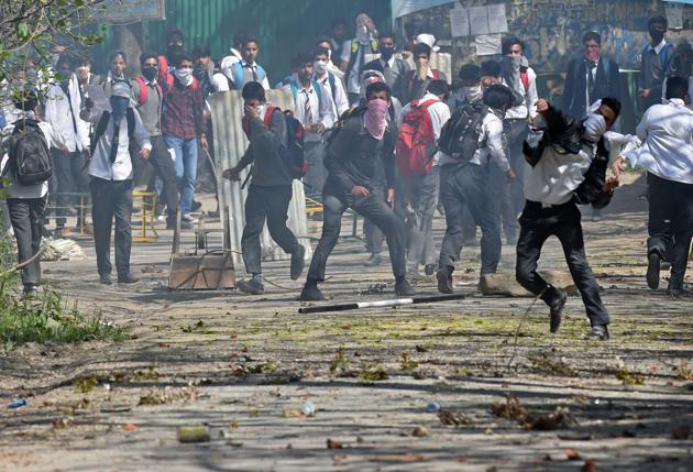Security forces used tear smoke shells to chase away the protesters, the official said, adding that clashes were going on when the last reports came in. (Tauseef Mustafa / AFP)