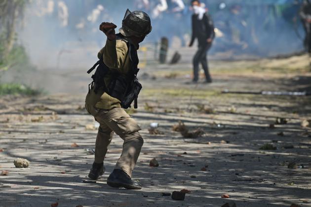 A group of students were holding a protest rally near Sri Pratap (SP) College on Moulana Azad road close to the Lal Chowk city centre this morning. (Tauseef Mustafa / AFP)