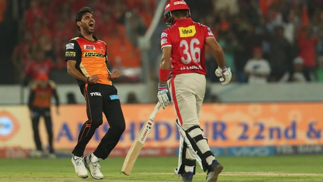 Bhuvneshwar Kumar of Sunrisers Hyderabad exults after dismissing Kings XI Punjab’s Manan Vohra during the 2017 Indian Premier League match at the Rajiv Gandhi International Stadium in Hyderabad on Monday. Get full cricket score of Sunrisers Hyderabad vs Kings XI Punjab here.(BCCI)