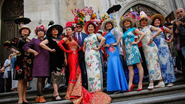 Participants and spectators stroll along Fifth Avenue during the Easter Parade and Bonnet Festival. (KENA BETANCUR / AFP) Participants and spectators stroll along Fifth Avenue during the Easter Parade and Bonnet Festival. (KENA BETANCUR / AFP)