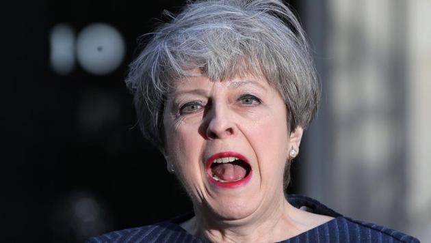 British Prime Minister Theresa May speaks to the media outside 10, Downing Street in central London on Tuesday. (AFP) British Prime Minister Theresa May speaks to the media outside 10, Downing Street in central London on Tuesday. (AFP)