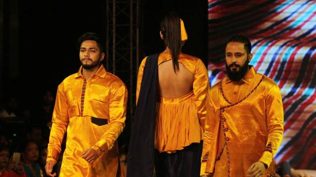 Models on the ramp during Ludhiana Fashion Week by students on Monday. (Jagtinder Singh Grewal/HT Photo)