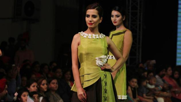 Models on the ramp during Ludhiana Fashion Week by students on Monday. (Jagtinder Singh Grewal/HT Photo)