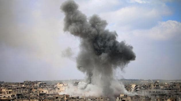 Jets struck the town of al-Bukamal killing three militants and 13 civilians including children, the monitor said.(AFP File)