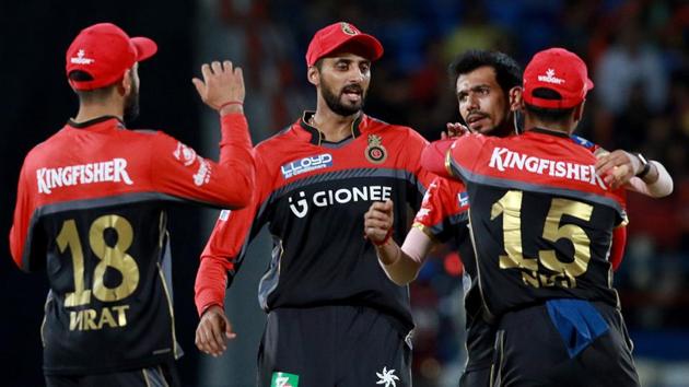 Yuzvendra Chahal of Royal Challengers Bangalore celebrates the wicket of Gujarat Lions’ Brendon McCullum during their 2017 Indian Premier League at the Saurashtra Cricket Association Stadium in Rajkot on Tuesday. Catch full scorecard of Gujarat Lions vs Royal Challengers Bangalore here.(BCCI)