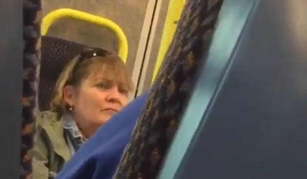 In the videos, originally posted on Twitter, the woman can be seen and heard abusing other passengers.(Twitter Screengrab)