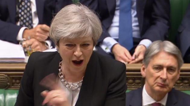 An image taken from footage broadcast by the UK Parliamentary Recording Unit on April 19, 2017 shows Prime Minister Theresa May speaking during Prime Minister’s Questions in the House of Commons in London. Britain's parliament votes on Wednesday on holding a snap election in June as May seeks to make strong gains against the opposition before gruelling Brexit negotiations.(AFP)