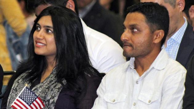 India-born US national cricket team player Timil Kaushik Patel (right) and his wife Pooja Patel at the naturalisation ceremony in Los Angeles on Tuesday. Patel says becoming an American will help bring new players onto the team since there's only three spots allowed for non-citizen residents. (AP) India-born US national cricket team player Timil Kaushik Patel (right) and his wife Pooja Patel at the naturalisation ceremony in Los Angeles on Tuesday. Patel says becoming an American will help bring new players onto the team since there's only three spots allowed for non-citizen residents. (AP)