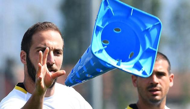 The mood was lighthearted during the Juventus training session on Wednesday with Argentine striker Gonzalo Higuain and fellow players having some fun on the pitch. The Italian giants have a 3-0 advantage going into their quarterfinal second-leg match against FC Barcelona and are confident of keeping the Catalans at bay. (AP) The mood was lighthearted during the Juventus training session on Wednesday with Argentine striker Gonzalo Higuain and fellow players having some fun on the pitch. The Italian giants have a 3-0 advantage going into their quarterfinal second-leg match against FC Barcelona and are confident of keeping the Catalans at bay. (AP)