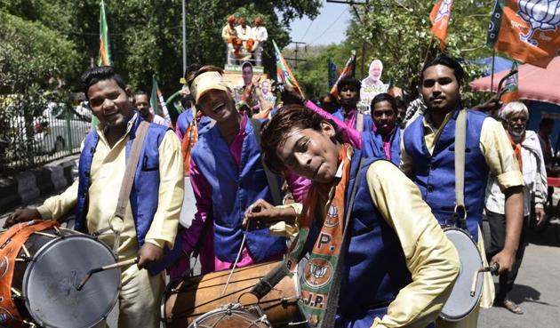 Supporters of Bharatiya Janata Party (BJP) during the MCD election campaign in Pushp Vihar (Burhaan Kinu/HT Photo/For representation only) Supporters of Bharatiya Janata Party (BJP) during the MCD election campaign in Pushp Vihar (Burhaan Kinu/HT Photo/For representation only)