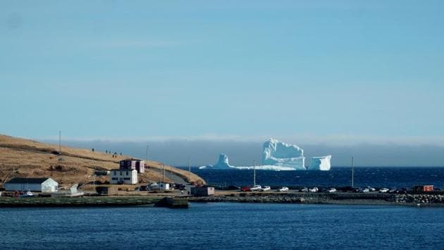 The view of the iceberg from Ferryland on Newfoundland’s Southern Shore. (REUTERS)