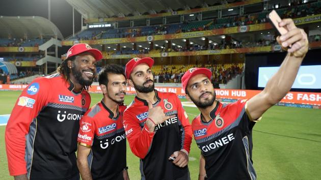 Royal Challengers Bangalore players (starting from left) Chris Gayle, Yuzvendra Chahal, Virat Kohli and Mandeep Singh click a selfie after their 21-run win over Gujarat Lions. (BCCI )