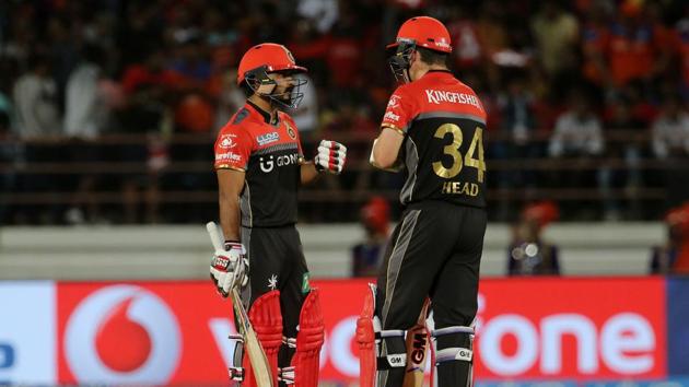 Kedar Jadhav (L) and Travis Head (R) added some crucial runs towards the end of RCB’s innings, as the visitors finished with a huge total of 213/2. (BCCI)